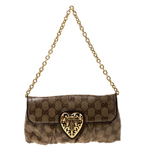 gucci anatomical heart clutch|gucci hysteria clutch.